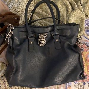 Michael Kors medium sized purse.VERY clean inside